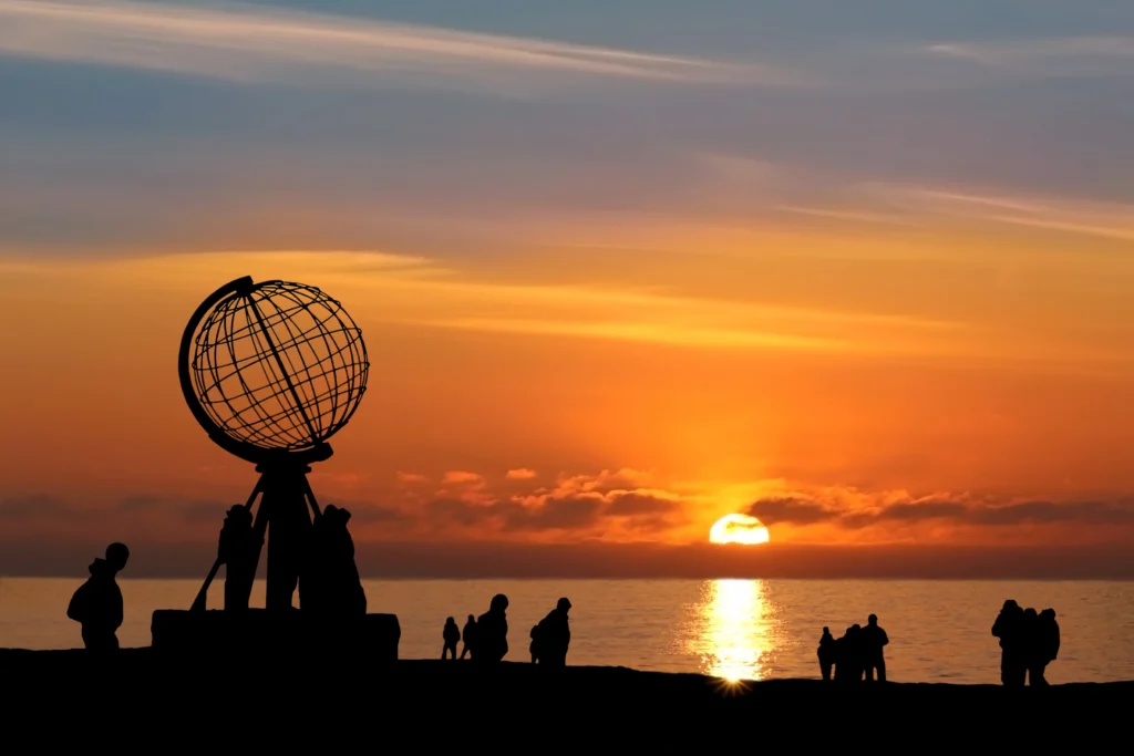 The North Cape at midnight and showing the globe monument 